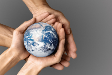 people-holding-earth-their-hands